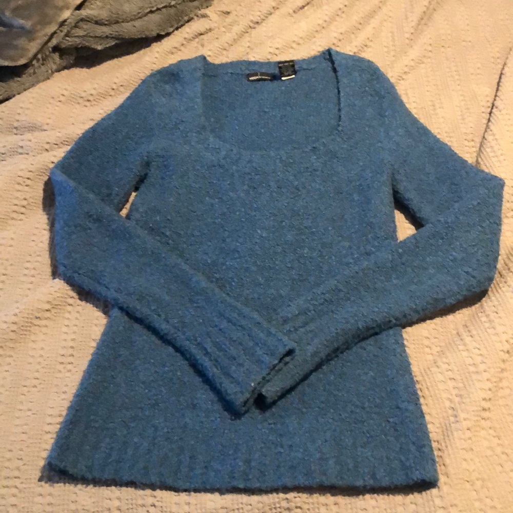 Medium wool sweater. Super cozy.